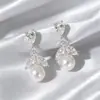 Pendientes de Flor de Zirconia y Perla de Diseño Exclusivo, Pendientes Femeninos y Delicados, Pequeños y Versátiles, Pendientes de Alta Gama