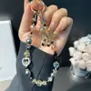 Pingente Versátil de Cristal com Contas em Formato de Coração para Corrente de Celular Pingente de Sapatilha de Ballet Chaveiro de Bolsa Acessório de Alça de Pulso