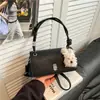 Nova bolsa quadrada pequena elegante para mulheres 2026, uma bolsa de ombro e bolsa transversal estilosa e versátil com um toque de luxo