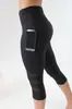 2022 transfronterizos europeos y americanos AliExpress nuevos pantalones de yoga bolsillo malla costura pantalones deportivos cortos leggings mujer
