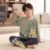 Pijamas y Ropa de Casa para Niños Primavera 2026 Estilo Nuevo Primavera y Otoño para Niñas Algodón Puro Conjunto de Ropa de Algodón para Bebés Niños Ropa para Exteriores