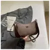 Bolsa para Comercio Electrónico Transfronterizo Fábrica de Origen Bolso de Hombro de Moda para Mujer Nuevo Bolso de Mujer con Forma de Media Luna