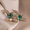 Novo broche estilo antigo de alta qualidade ins para mulheres estilo chinês leque borla pino de terno placket de pressão cheongsam corsage atacado