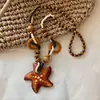 Colar com Pingente de Estrela do Mar Flor de Contas de Madeira Estilo Étnico Boêmio Anel Longo de Alto Valor Retrô Colar Versátil