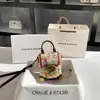 Moda de Nicho Dropshipping Bolso Caja Graffiti Estilo Nuevo 2025 Bolso para Teléfono de Bloqueo de Color de Gama Alta Venta al por Mayor