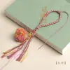 Cuerda de juego tejida con hilo de algodón hilado a mano, cuerda para colgar bola de algodón, colgante de juguete cultural Bodhi tibetano, cuerda para colgar en teléfono móvil DIY