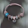 Pulsera simple de acero inoxidable europea y americana nota hueca aleación con cuentas DIY colgante de corona Pulsera de dama