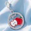 Exquisito colgante de cereza con incrustaciones de diamantes, efecto de goteo de aceite, llavero de fruta realista, accesorios decorativos DIY para bolsos