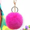 Al por mayor en stock Bola de pelo de imitación de conejo Rex de 8 cm llavero colgante lindo para mujer bolso de coche teléfono móvil colgante de felpa
