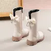 Botas Longas Femininas com Laço de Borboleta 2026 Outono/Inverno Novo Estilo Botas Longas Femininas Botas de Princesa Botas de Couro Preto Aveludadas Botas Altas