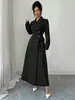 Ropa Femenina Transfronteriza Europea y Americana Otoño/Invierno 2026 Solapa Manga Larga Cintura Ceñida Larga para Viaje Estilo Traje Gabardina Abrigo