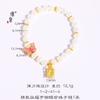 Tienda de oro Jin Yan con pulsera de mariposa y perla dorada arena, pulsera de mariposa pequeña azul quemada, pulsera pequeña de la suerte de marca dulce que combina con todo.