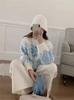 Otoño e invierno toma real feria isla jacquard suéter mujer nuevo ambiente cuello redondo copo de nieve Navidad suave ceroso suéter top