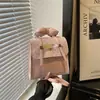 Coleção Outono/Inverno 2026 Transfronteiriça: mochilas infantis, com designs combinando para pais e filhos, com padrões de desenhos animados bordados, mochilas pequenas estilosas e requintadas