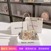 Una generación de bolsos de sillín de diseño pequeño con contraste de color para graffiti, bolso de hombro/axila de alto diseño 2024 venta al por mayor