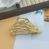 Presilha de Cabelo Europeia e Americana Estilo Caveira Garra Liga, Piranha de Cabelo Nicho para Coques na Parte de Trás da Cabeça, Presilha Tubarão de Alta Qualidade Acessório de Cabelo Atacado