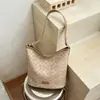 Bolso de gran capacidad para mujer para otoño, versátil bolso cruzado y de hombro casual nuevo 2026, popular bolso tipo cubo coreano para el día a día