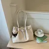 Bolso de mano de moda de gran capacidad para ir al trabajo, nuevo bolso tote verano 2026, bolso de hombro o axila relajado y único