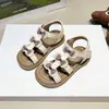 Zapatos de Princesa Calados con Punta Abierta para Niñas 2026 Primavera/Verano Nuevos Zapatos Casuales Versátiles de Moda con Lazo Estilo Romano