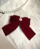Nuevo Vestido de Tostado Retro Francés de Terciopelo Tocado Pinza para el Pelo con Lazo de Perla Accesorios para el Cabello Elegantes con Textura para Mujer Año Nuevo
