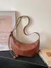 Bolsas Retrô de Nicho Outono e Inverno para Mulheres 2025 Nova Bolsa de Ombro Transversal Casual Versátil Bolsa Tote de Grande Capacidade para o Dia a Dia