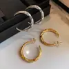 Pendientes Geométricos Retorcidos Incrustados con Diamantes de Aguja Plateada, Pendientes de Lujo Ligero y Gama Alta Estilo Europeo y Americano, Moda de Nicho y Pendientes Elegantes para Mujer al por Mayor