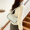 Bolsa Simples de Ombro para Axila Outono 2026 Nova Moda Feminina Bolsa Feminina Chic Estampa de Laço Bolsa de Ombro Único