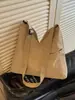 Bolso de hombro de estilo coreano simple retro de nicho transfronterizo 2026, bolso de mano casual de color sólido de gran capacidad
