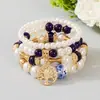 Pulsera de cuentas de moda bohemia de venta caliente transfronteriza con colgante de árbol de la vida y conjunto de pulseras en capas de perlas artificiales al por mayor