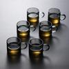Taza de té de kung fu al por mayor de fábrica con asa de color, taza de té pequeña de vidrio de borosilicato con asa, taza de té pequeña recta transparente con asa
