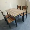 Fabricante directo de mesas y sillas para comedores de comida rápida, muebles de acero-madera-hierro, una mesa con cuatro sillas, para uso doméstico, tiendas de té de leche, cafeterías, restaurantes sencillos, venta al por mayor