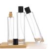Venta al por mayor en stock, botella de perfume de bayoneta, embalaje de cosméticos, botella de vidrio vacía cilíndrica para aromaterapia, botella con atomizador de 100 ml