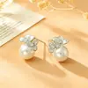 Pendientes populares de flor y perla de moda, de alta gama, elegantes, con diseño único, pendientes de nicho para mujer