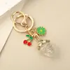 Pendente Criativo Artificial Estéreo Morango Cereja Fofo Pequeno Chaveiro de Liga Metálica Flor Doce Japonês e Coreano Acessórios
