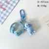 Auriculares estilo influencer, llavero de figura minimalista, colgante de muñeca de resina 3D, suministro al por mayor para vendedores de comercio electrónico