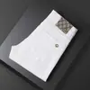 Marca de Alta Gama de Moda Otoño e Invierno 2026 Juveniles Elásticos Ajustados Rectos Blancos con Decoración Forro Polar Engrosado Jeans para Hombre