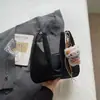 Bolsa de Ombro de Alta Qualidade para Mulheres, Nova Moda Primavera 2026, Bolsa de Ombro Super Popular para Trabalho e Deslocamento, Bolsa Transversal
