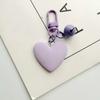 Nuevo llavero con colgante de campana de amor, resina de color caramelo, accesorios de corazón, bolso creativo, colgante de joyería