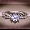 Anillo de Compromiso Nueve Nuo Deseo Nuevo Imitación Moissanita Transfronterizo Europa y Estados Unidos Infinito Hueco Seis Garras Propuesta Anillo de Diamante