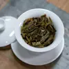 Chá cru Pu'er da barragem torta da Islândia 357g Árvore antiga de Yunnan Pu'er Sete bolos Fábrica de chá chá direto atacado