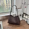 Bolsa de Mão com Textura Tecida Personalidade Transfronteiriça Feminina 2026 Nova Textura de Alta Qualidade Temperamento de Nicho Versátil Bolsa de Ombro Único para Axila