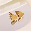 No es necesario quitarse los pendientes al ducharse, tachuelas para el cartílago de titanio, pendientes de gota de aceite, accesorios de diseño para el día a día, joyería de oído de moda al por mayor