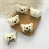 Nueva cabeza de animal de dibujos animados Muñeco de algodón tridimensional Oso con lazo Accesorios de decoración Oso festivo bufanda guantes accesorios