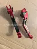 Venta al por mayor de fábrica manillar plegable CNC manillar de doble cara modificado para motocicleta manillar de bocina plegable manillar de freno