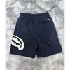 Shorts de tiburón estilo americano azul marino para hombre, shorts casuales holgados de verano hasta la rodilla, pantalones deportivos de marca modernos y de moda para pareja