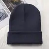 Gorros de lana para exteriores al por mayor para comercio exterior, gorros de punto de color liso, calentadores de cabeza tipo ski de estilo japonés para mujeres y hombres, gorros cálidos transfronterizos
