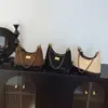 2025 Nova Elegante Cor Sólida Feminina de Inverno Grande Capacidade Retro Estilo Coreano Corrente na Alça Bolsa de Ombro Transversal Bolsa de Bolinho