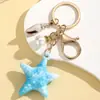 Creativo Vida Marina Colorido Halo Perla Estrella de Mar Llavero Colgante Lindo Colorido Estilo Océano Adorno de Estrella