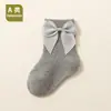 Meias de bebê, nova versão coreana para primavera e outono, meias de algodão penteado com laço estilo ins, meias de cano médio com barra solta para bebê, atacado transfronteiriço 2