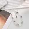 Cadena para teléfono móvil nuevo colgante de cordón para funda de teléfono móvil de alto valor colgante transfronterizo comercio exterior caliente al por mayor ins simple diy